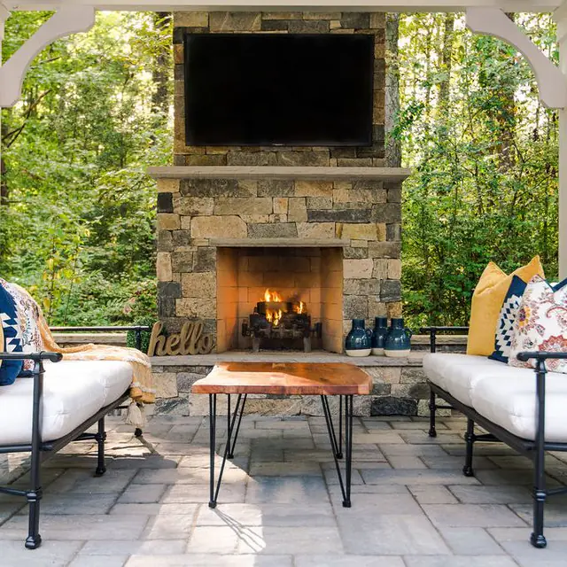Outdoor fireplace with outdoor television
