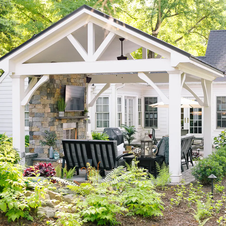 Beautiful white pavilion covering backyard patio
