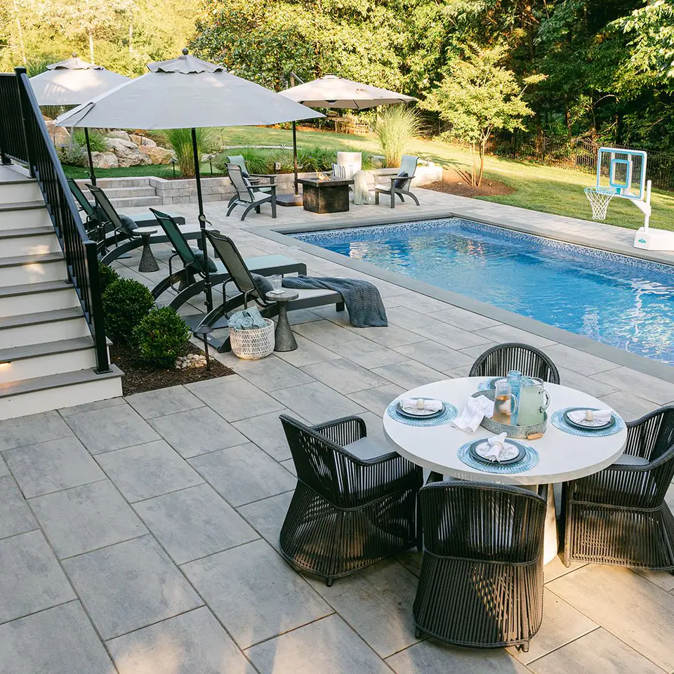 fiberglass pool with paver pool decking