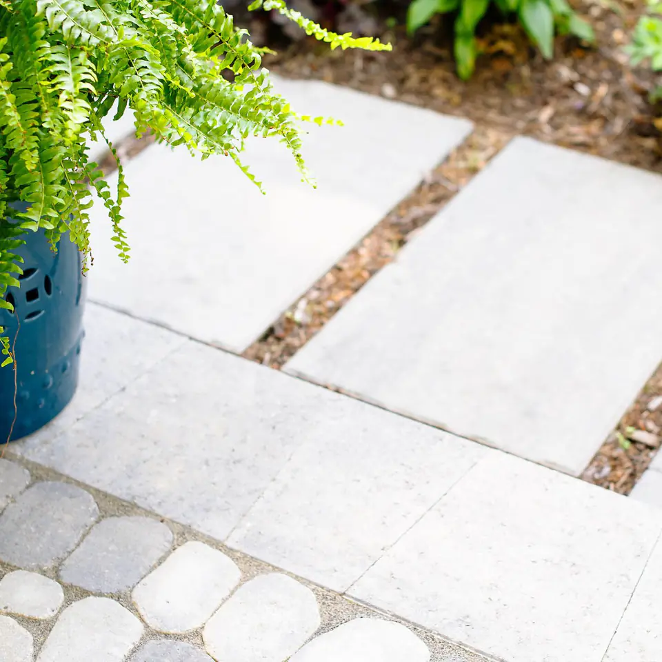 Natural stone walkway and patio with pavers